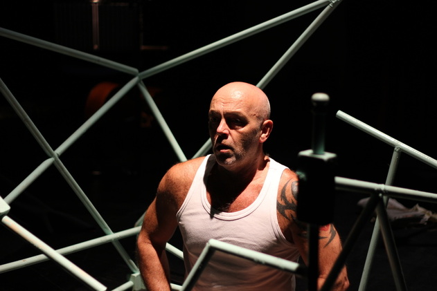 John Upperton performing Adam in Arthur Keegan-Bole's opera, The Interrogation of Adam Pollo